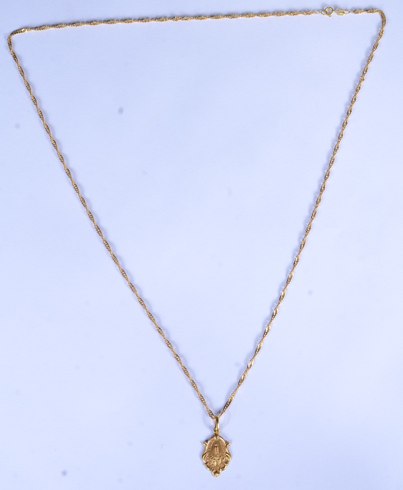 Colar de ouro 18 k., contraste 750 com pendente Sacro. (Por motivos... - foto 2 de 7