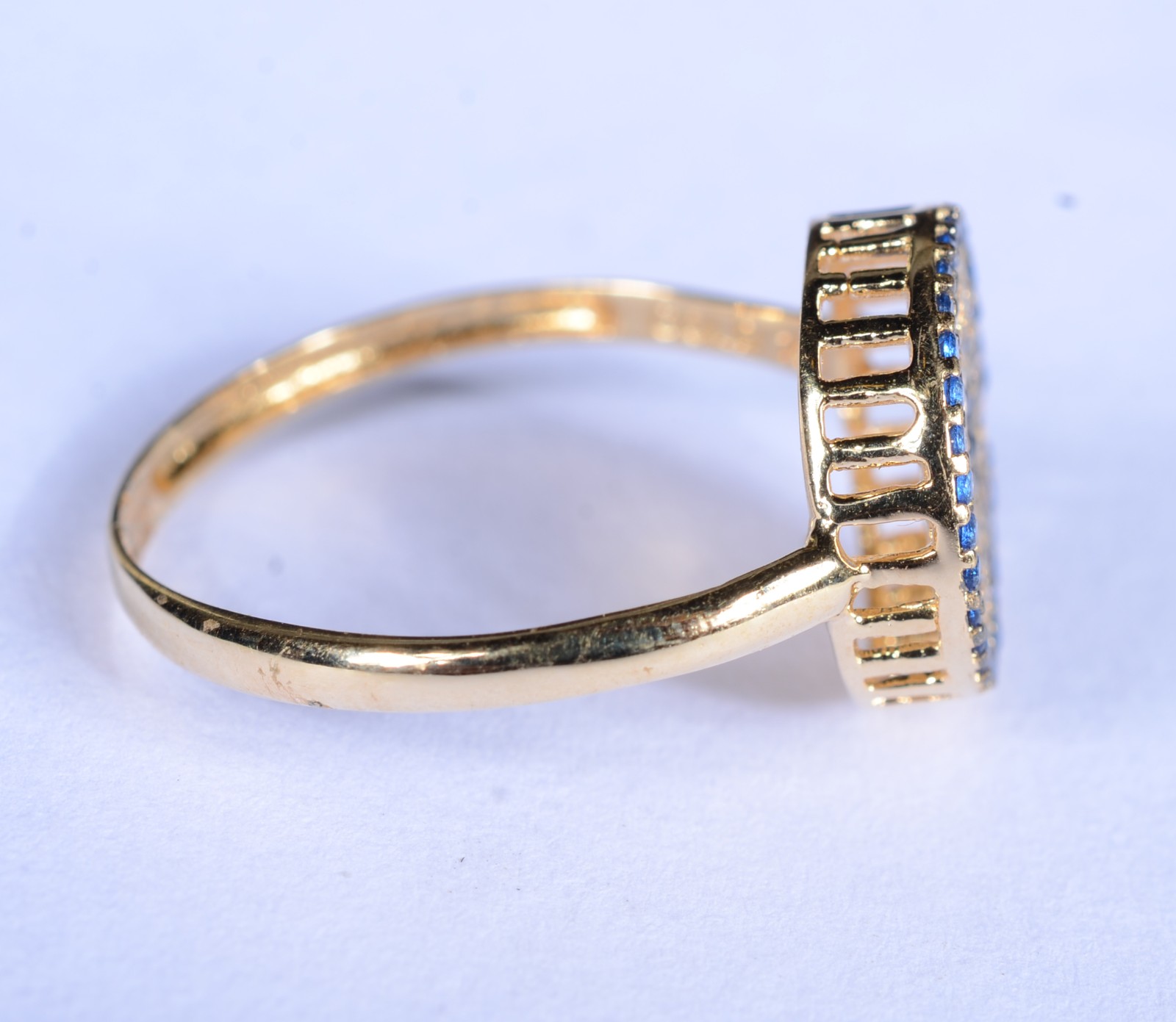 Anel de ouro 18 k., contraste 750 cravejado com safiras azuis, aro... - foto 5 de 7