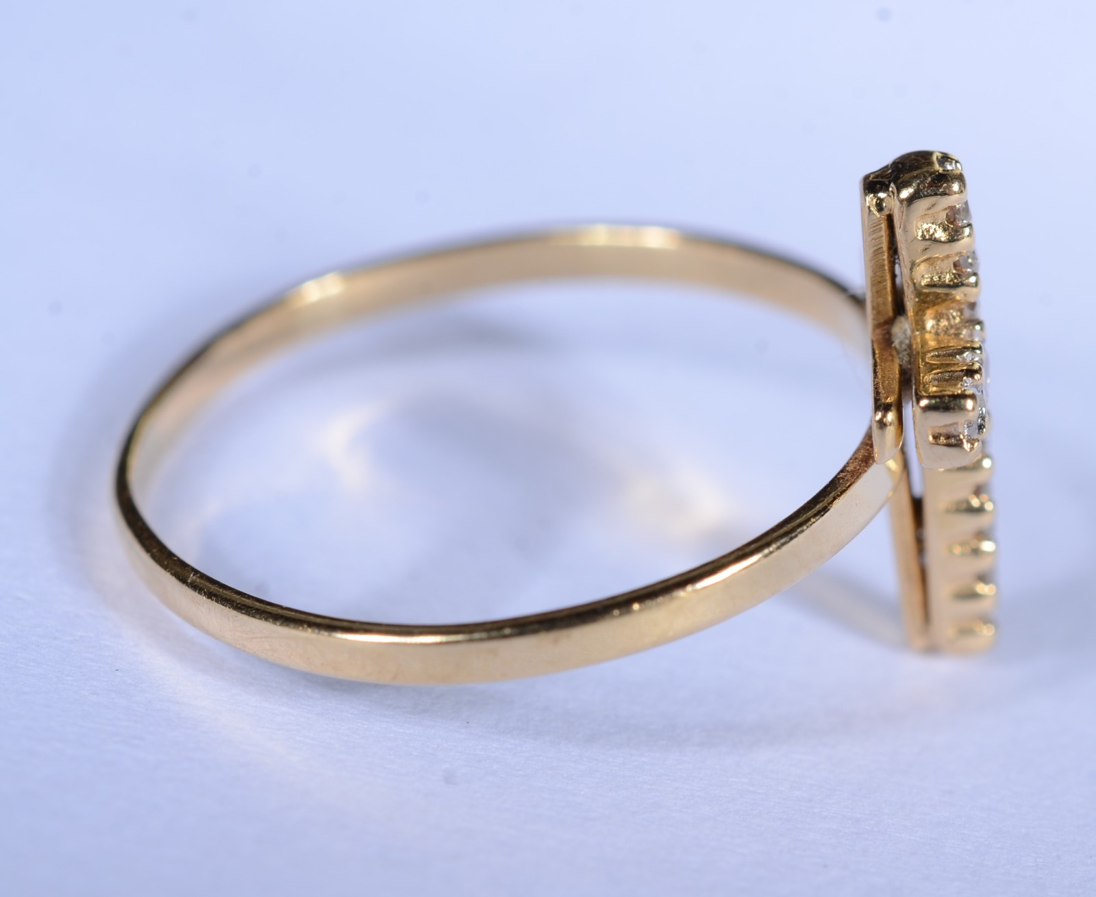 Anel de ouro 18 k., contraste 750 com cruz cravejada de brilhantes... - foto 4 de 7