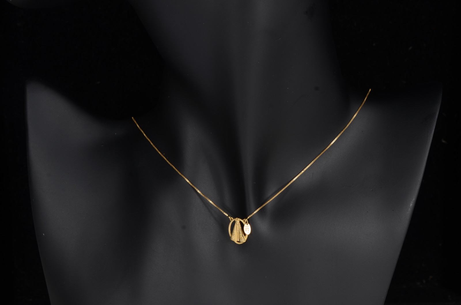 Colar de ouro 18 k., contraste 750 com pendente de Nossa Senhora... - foto 7 de 8