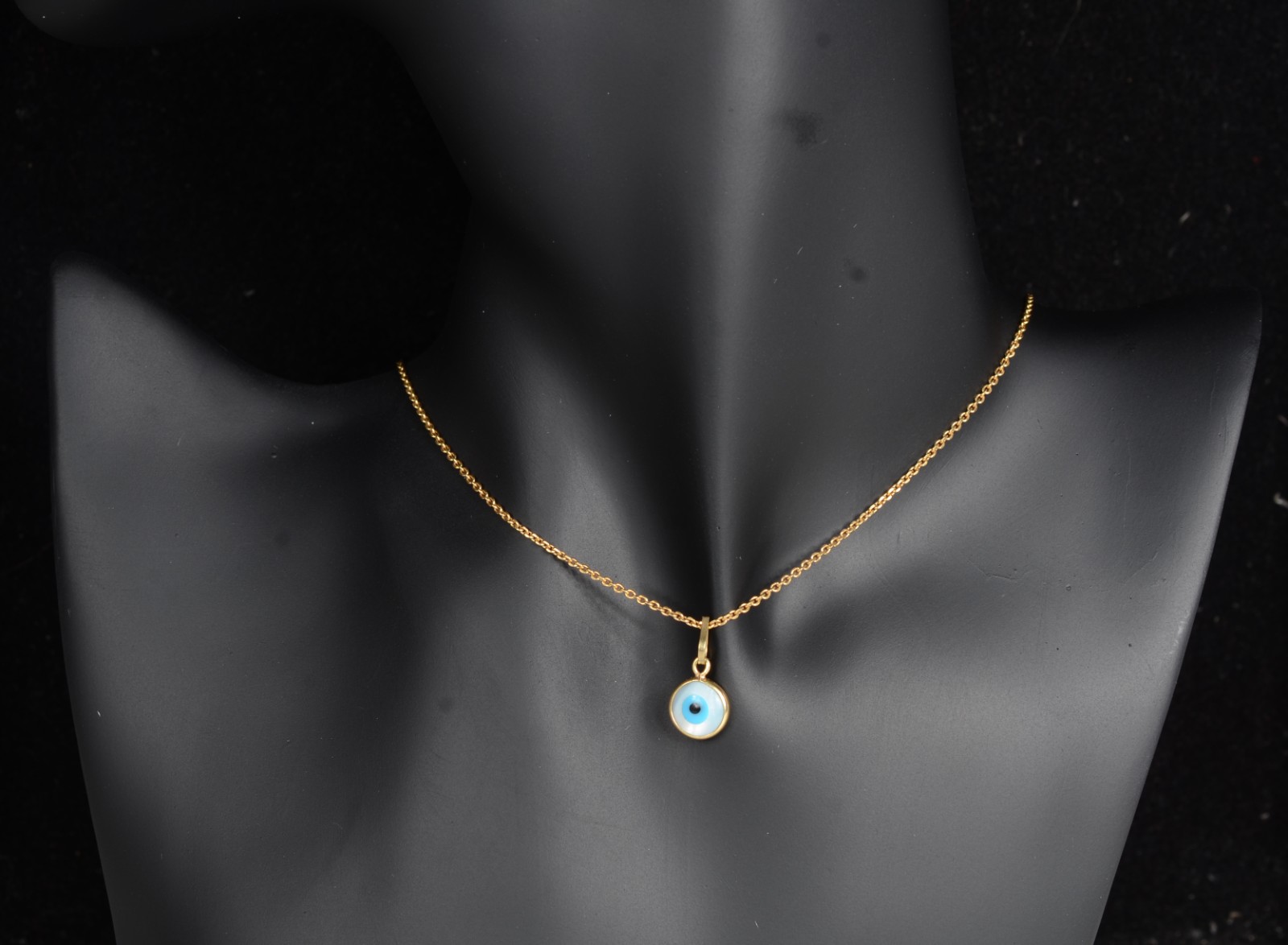 Colar de ouro 18 k., contraste 750 com pendente de olho grego. (Por... - foto 7 de 7