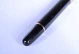 Montblanc (1906),  - Caneta tinteiro "Meisterstuck" na cor preta e dourada.