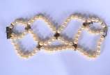 Pulseira de perolas com platina. (Por motivos d... - Pulseira de perolas com platina. (Por motivos de segurança a peça não se encontra na loja).