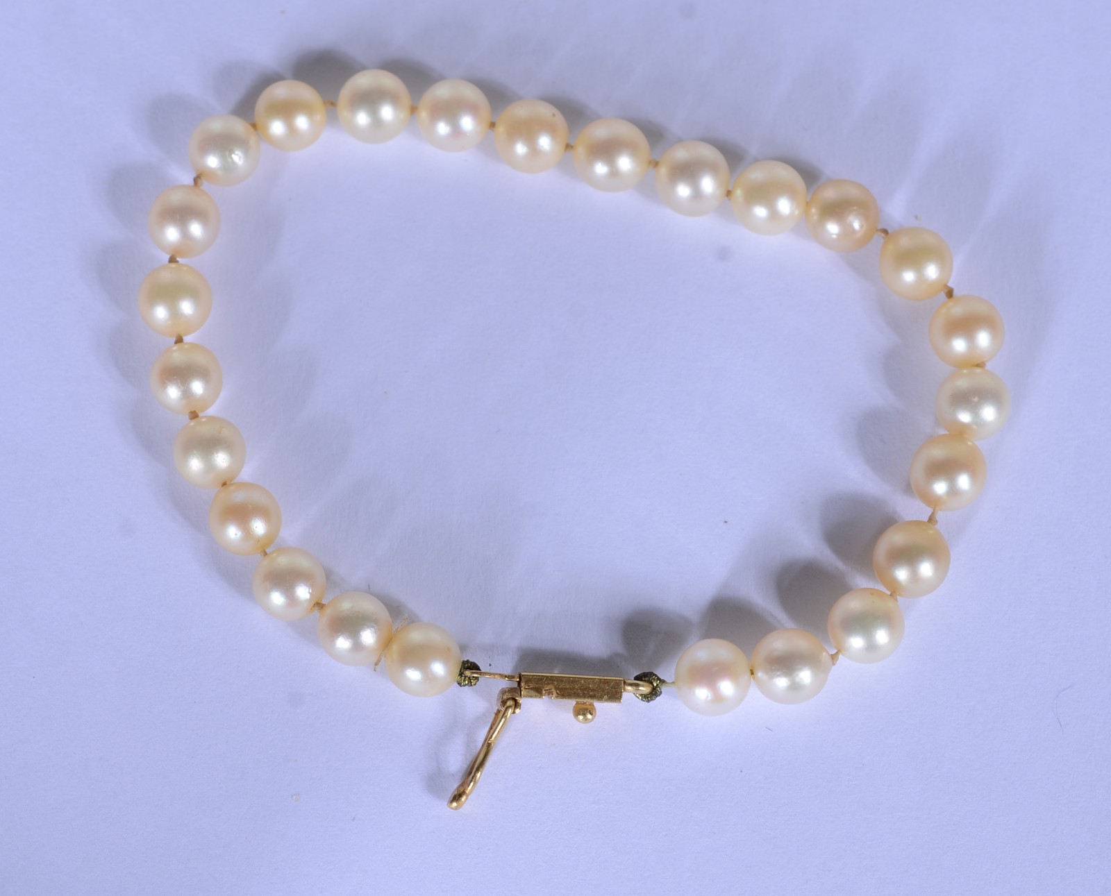 Conjunto de colar e pulseira de perolas com fecho de ouro 18 k... - foto 4 de 11