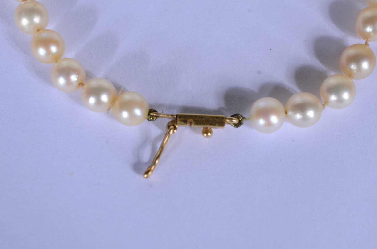 Conjunto de colar e pulseira de perolas com fecho de ouro 18 k... - foto 10 de 11