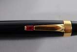 Montblanc (1906),  - Duas canetas na cor preta com dourado.