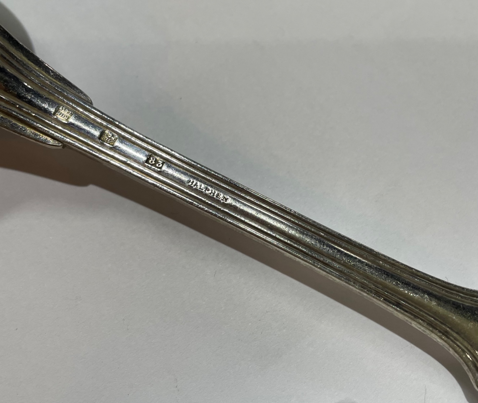 Parte de faqueiro de metal prateado, diversas marcas sendo alguns... - foto 5 de 5