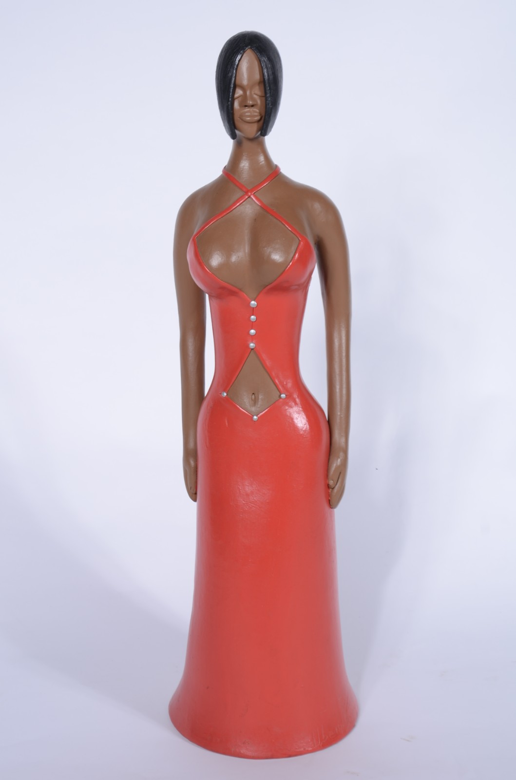 Escultura de barro cozido representando figura feminina de vestido... - foto 1 de 8