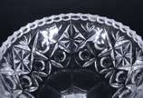 Três peças de cristal lapidado, sendo compoteir... - Três peças de cristal lapidado, sendo compoteira e dois bowls.