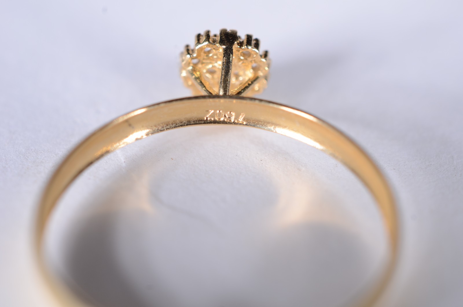 Anel de ouro 18 k., contraste 750 feitio chuveiro, aro 19. (Por... - foto 5 de 8
