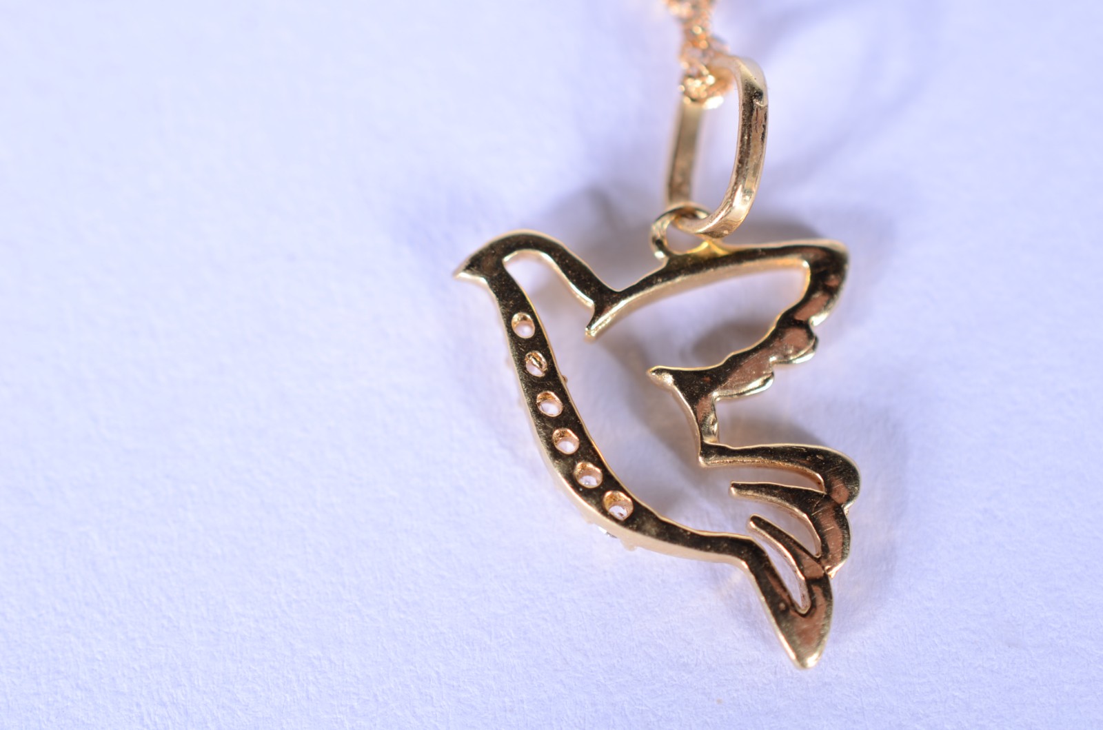 Colar de ouro 18 k., contraste 750 com pendente na forma de pomba da... - foto 3 de 6
