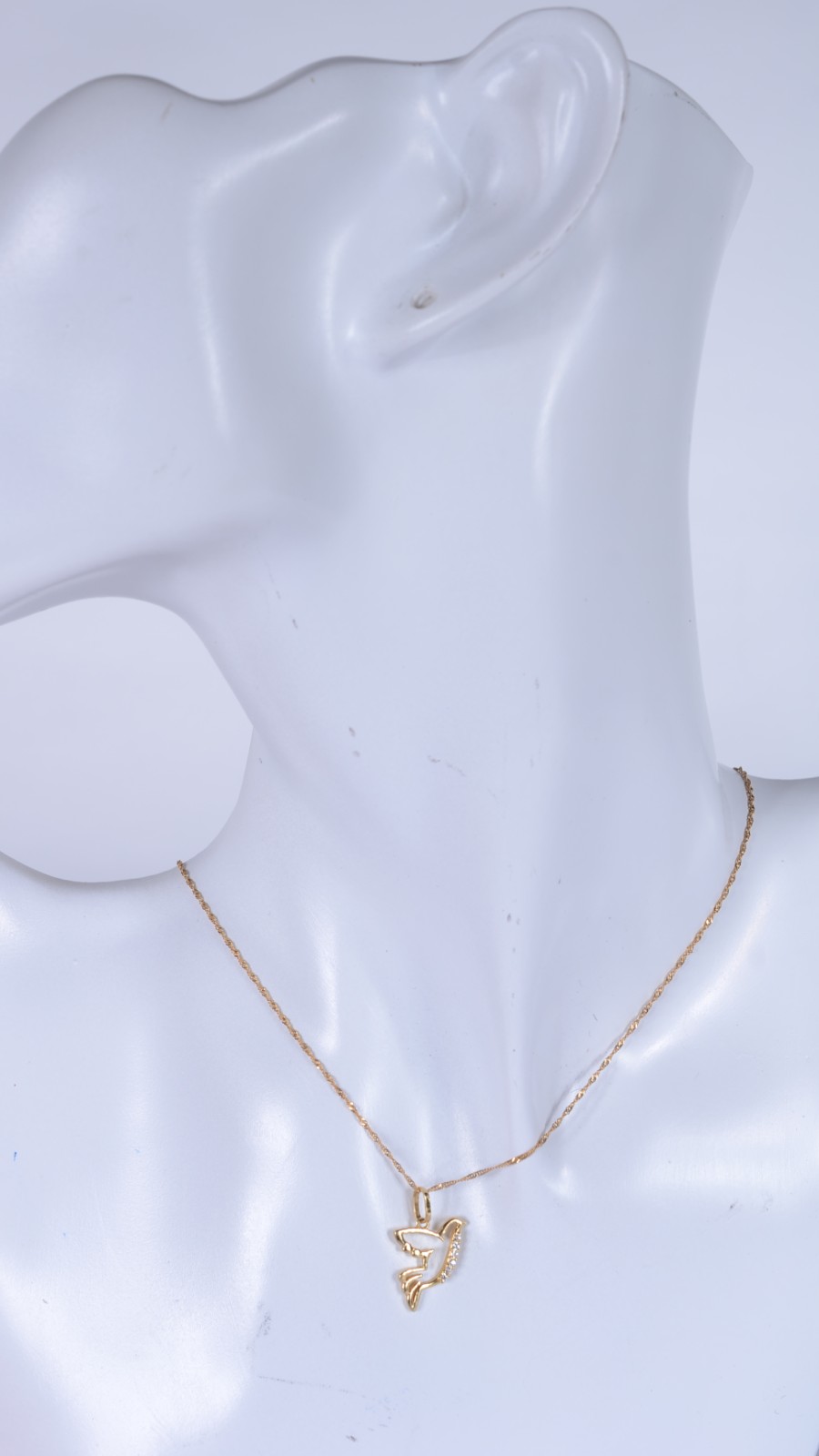 Colar de ouro 18 k., contraste 750 com pendente na forma de pomba da... - foto 6 de 6