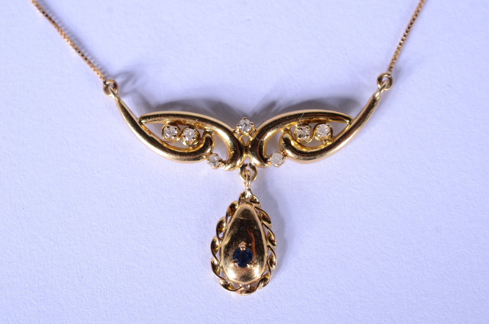 Gargantilha de ouro 18 k., contraste 750 com pendente cravejado com 7... - foto 1 de 6