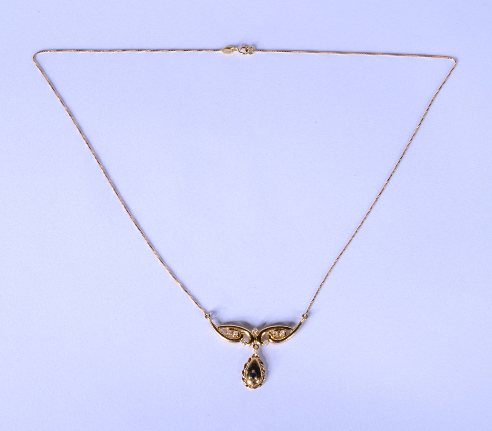 Gargantilha de ouro 18 k., contraste 750 com pendente cravejado com 7... - foto 2 de 6
