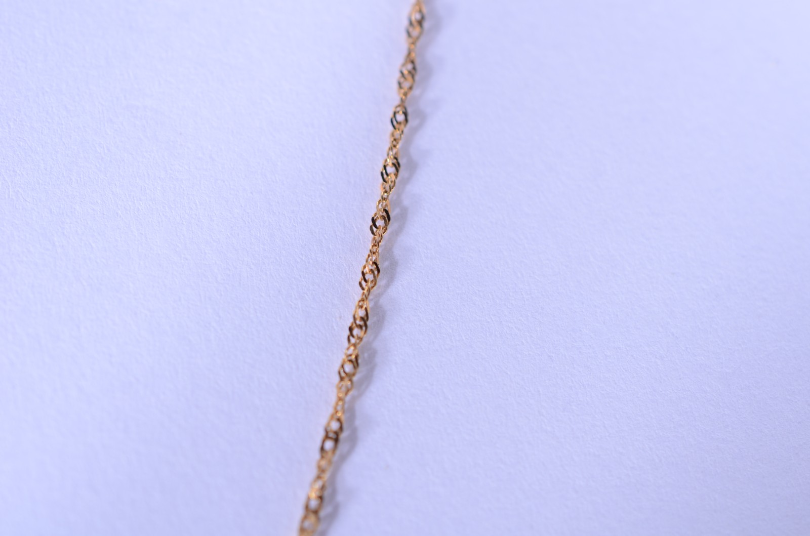 Colar de ouro 18 k., contraste 750 mls com crucifixo. (Por motivos de... - foto 3 de 6
