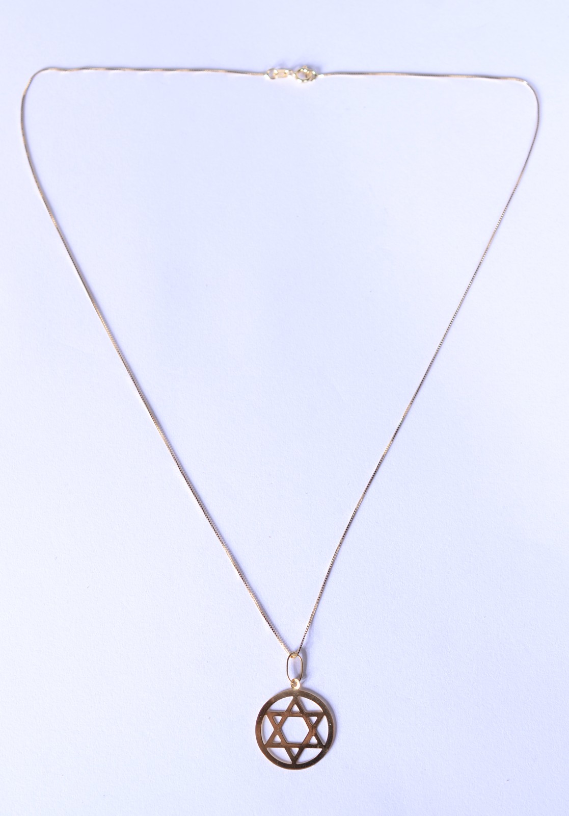 Colar de ouro 18 k., contraste 750 mls com pendente "Estrela de... - foto 2 de 5
