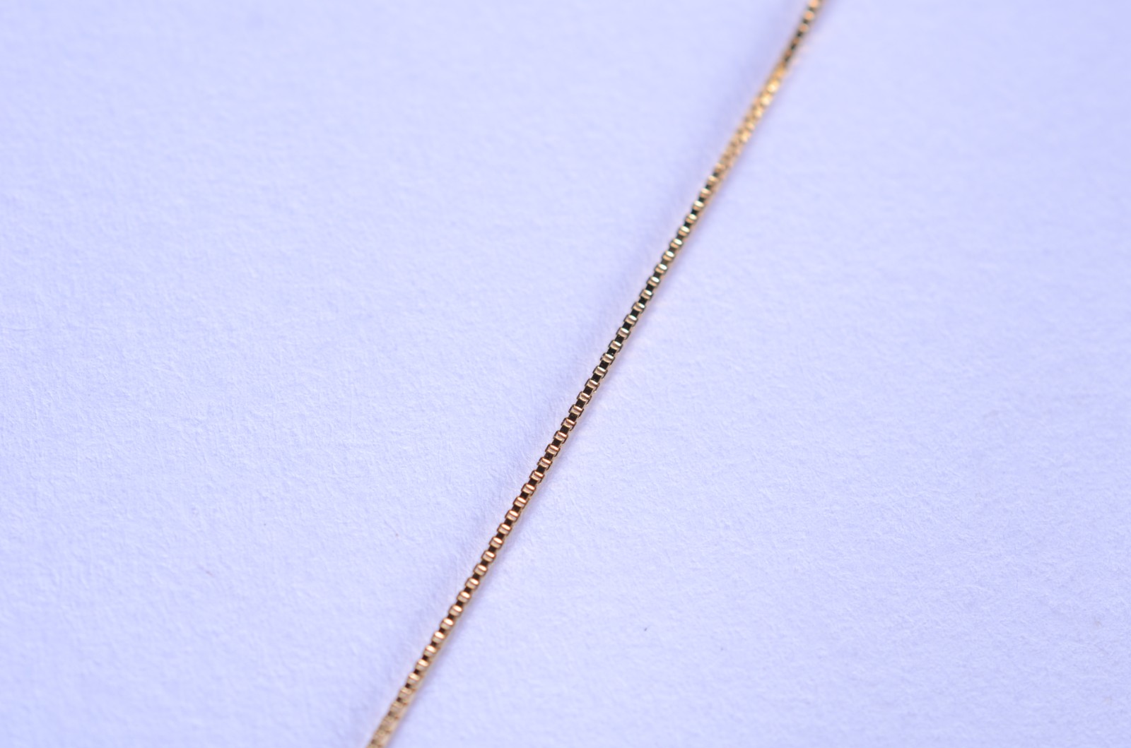 Colar de ouro 18 k., contraste 750 mls com crucifixo cravejado com... - foto 5 de 7
