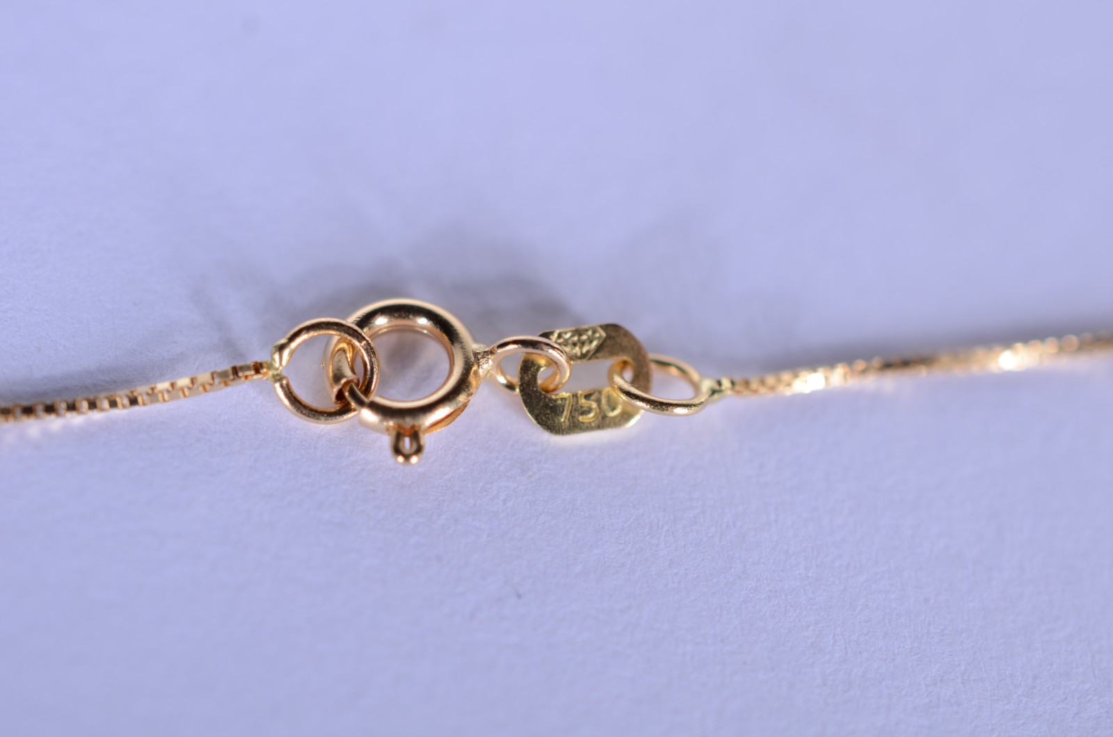 Colar de ouro 18 k., contraste 750 mls com crucifixo cravejado com... - foto 6 de 7