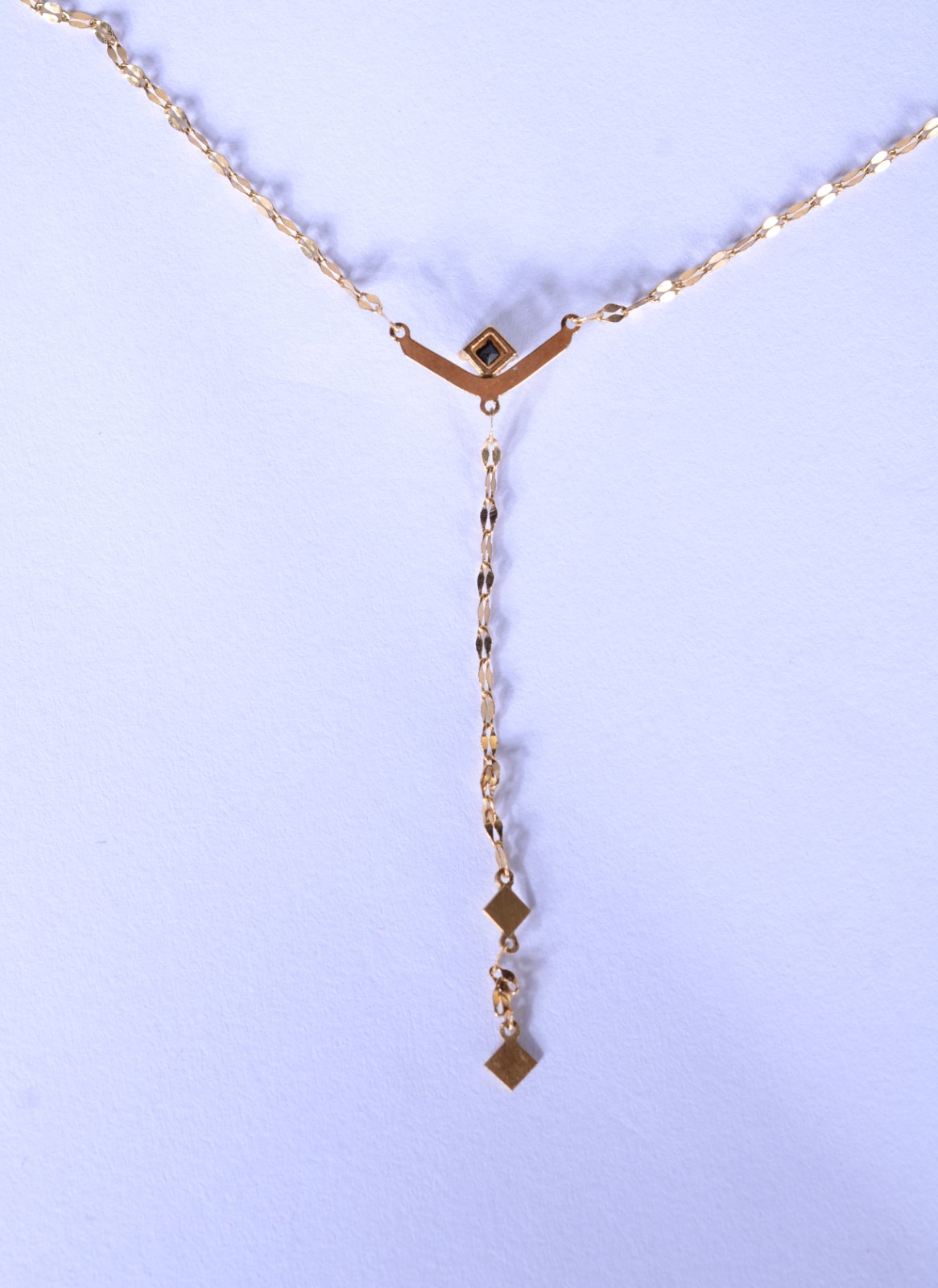 Colar de ouro 18 k., contraste 750 mls com pendente de pedra azul... - foto 6 de 10
