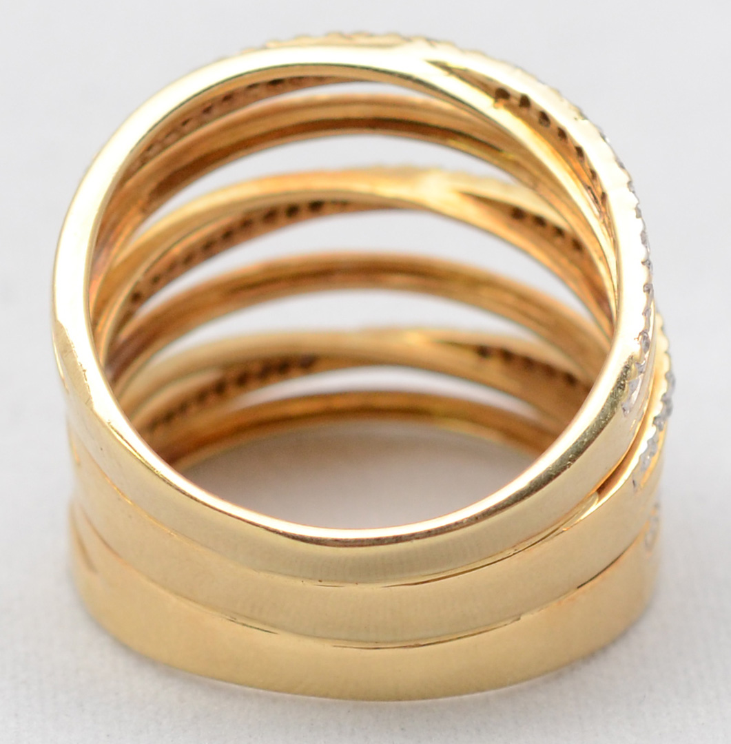 Anel em ouro amarelo 18 k com aproximadamente 0.70 ct de brilhantes... - foto 3 de 3