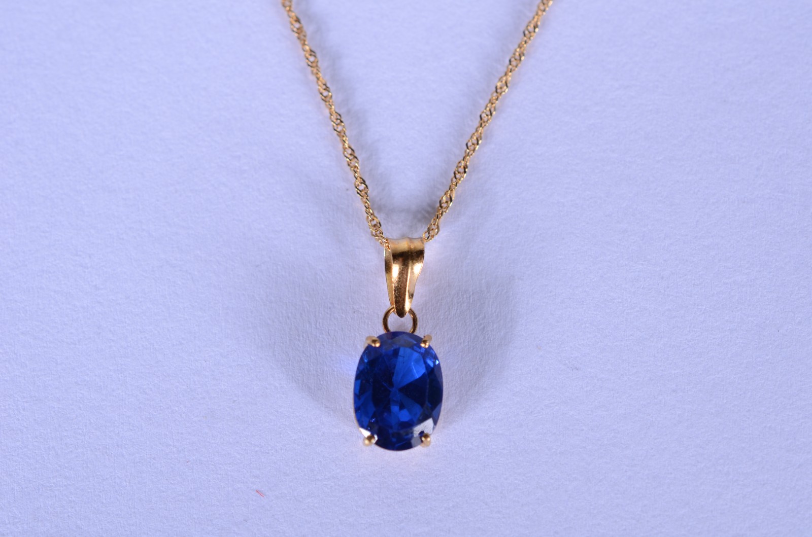 Colar de ouro 18 k., contraste 750 mls, pendente na forma de gota... - foto 1 de 6