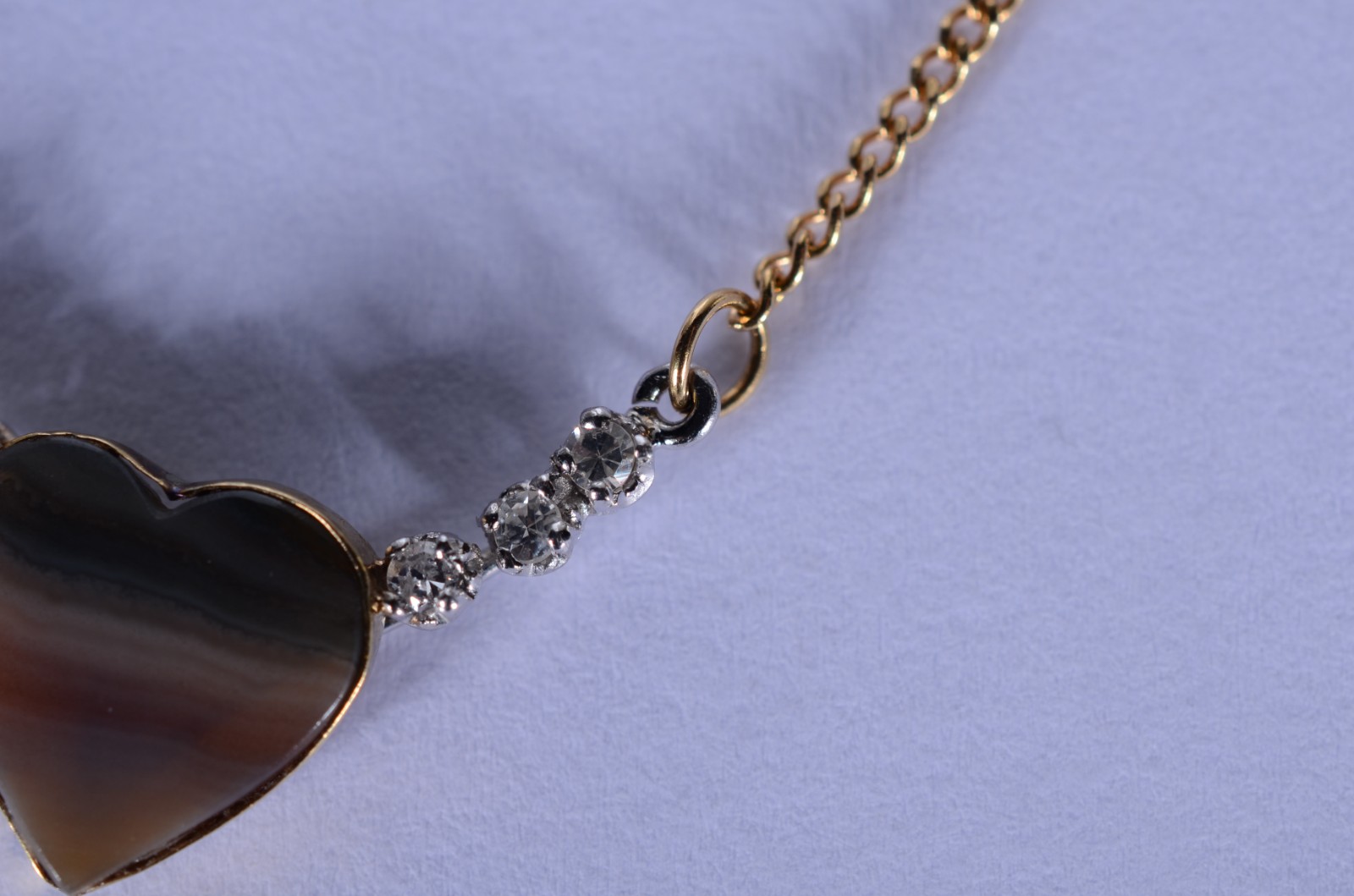 Colar com pendente feitio coração com pedra azul e 6 diamantes de... - foto 3 de 7