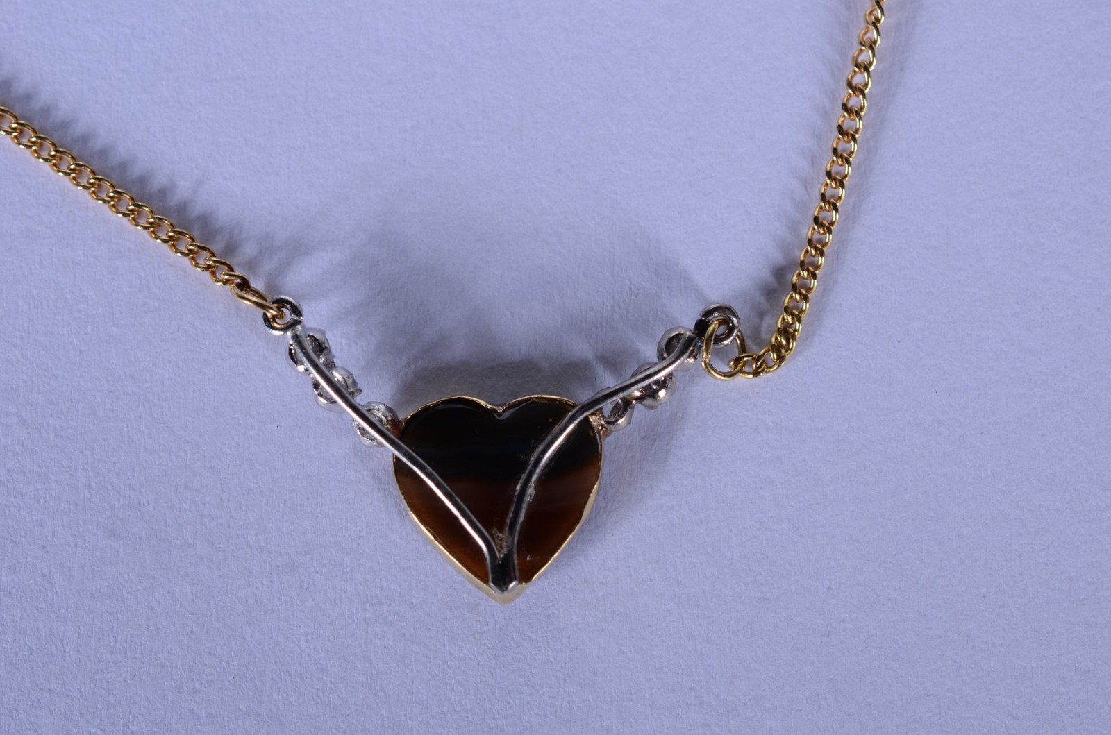 Colar com pendente feitio coração com pedra azul e 6 diamantes de... - foto 6 de 7
