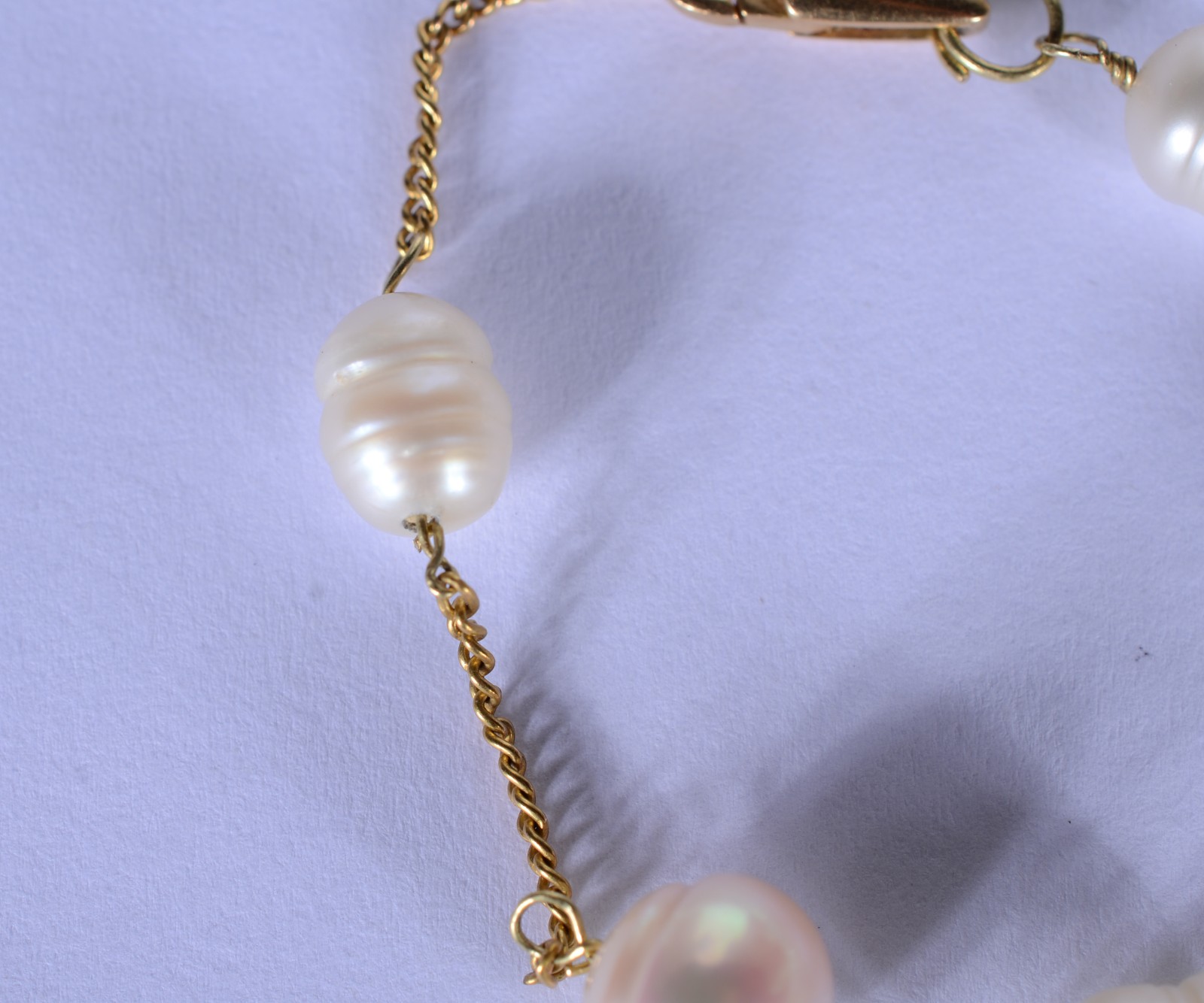 Pulseira de ouro 18 k., contraste 750 mls com cinco perolas. (Por... - foto 5 de 5