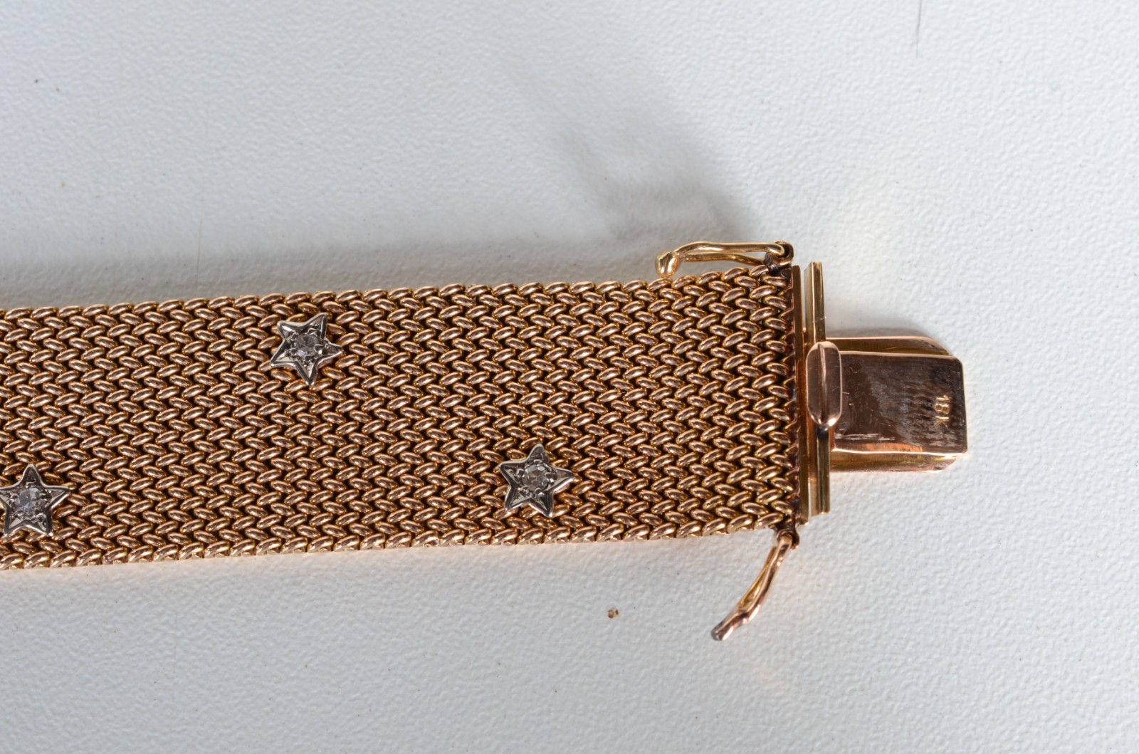 Pulseira de ouro 18 k., contraste 750 mls com estrelas e brilhantes... - foto 5 de 10