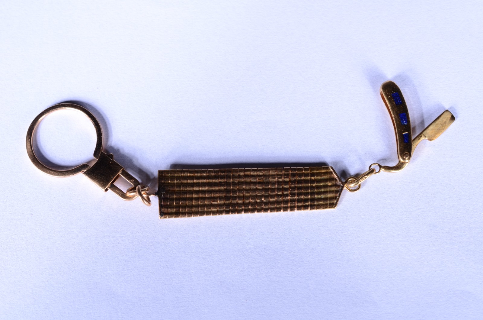 Chaveiro de ouro 18 k, com pequena navalha. (Por motivos de segurança... - foto 2 de 7