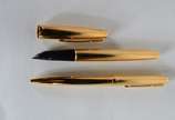 PARKER,  - Conjunto com 2 canetas douradas Parker 51 - MK II, sendo uma tinteiro e outra esferográfica.