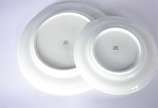 Aparelho de porcelana Real, composto de: 12 pra... - Aparelho de porcelana Real, composto de: 12 pratos rasos, 12 pratos fundos, 12 pratos de sobremesa e 12 para pão. Total: 48 peças.