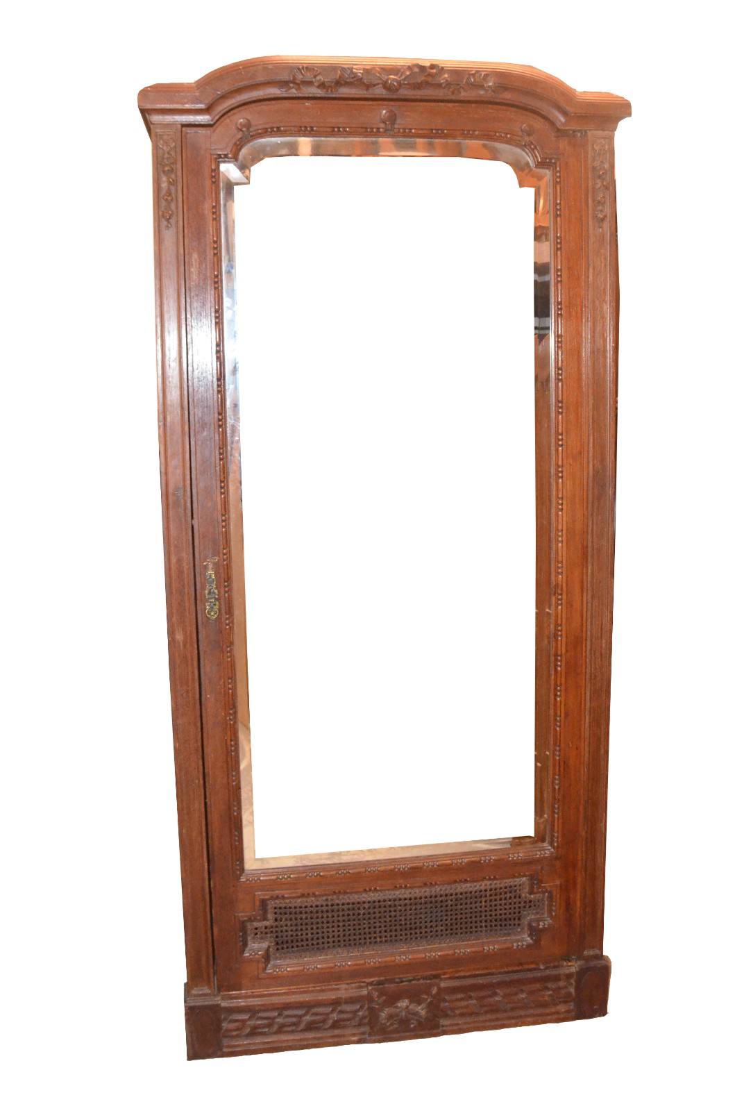 Armário de madeira nobre com uma porta com espelho bisotado, detalhe... - foto 1 de 7