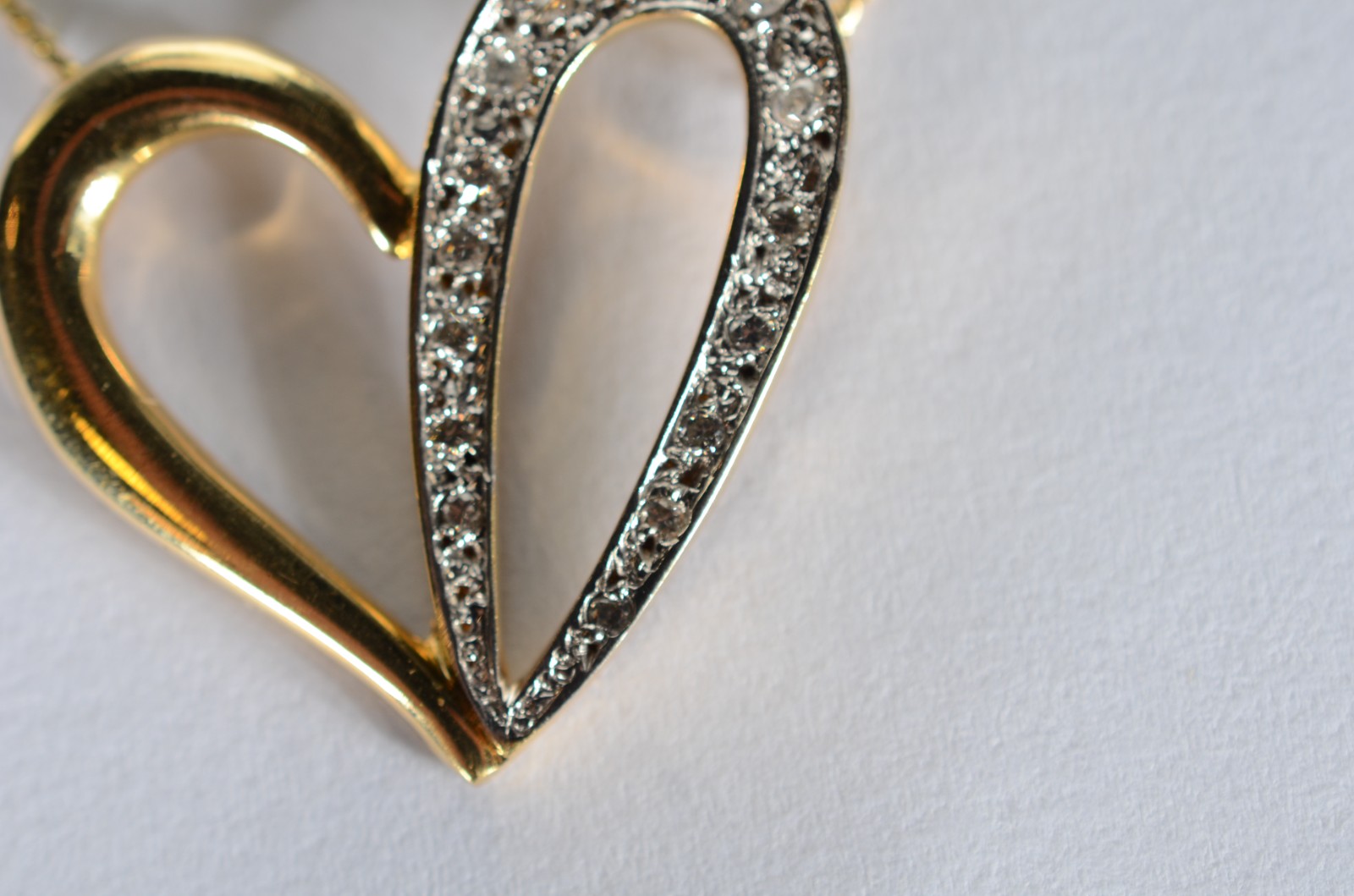 Colar com pendente feitio coração com vazados de ouro 18 k... - foto 4 de 7