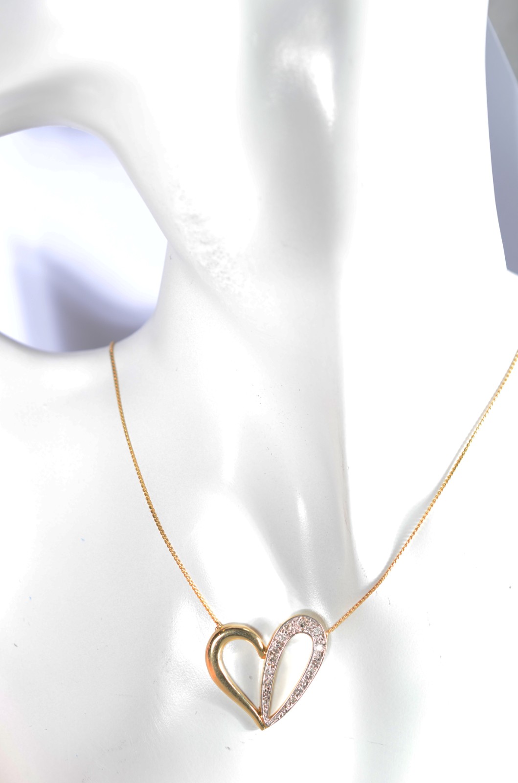 Colar com pendente feitio coração com vazados de ouro 18 k... - foto 7 de 7