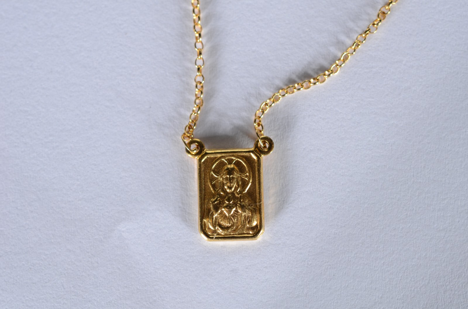 Colar com medalha de ouro 18 k., contraste 750 mls. (Por motivos de... - foto 5 de 6