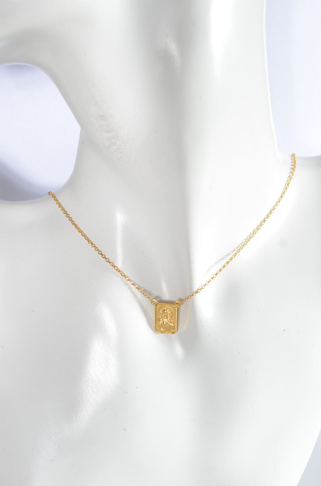 Colar com medalha de ouro 18 k., contraste 750 mls. (Por motivos de... - foto 6 de 6