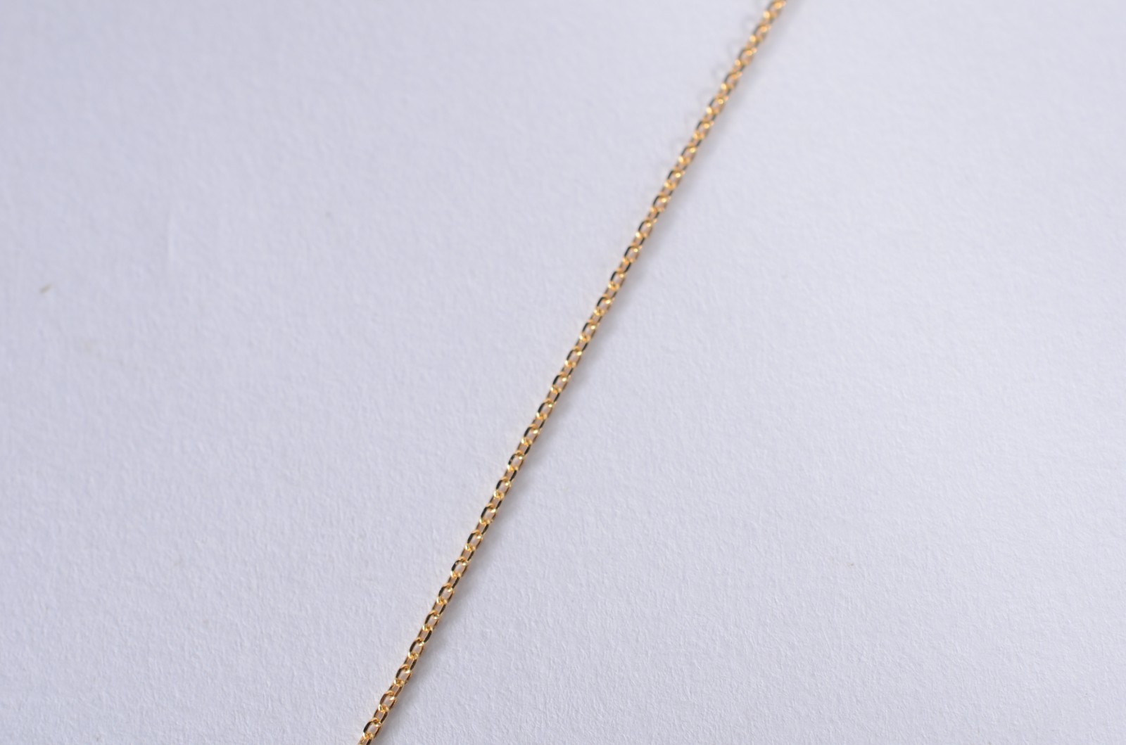 Colar de ouro 18 k., contraste 750 mls com crucifixo. (Por motivos de... - foto 2 de 5
