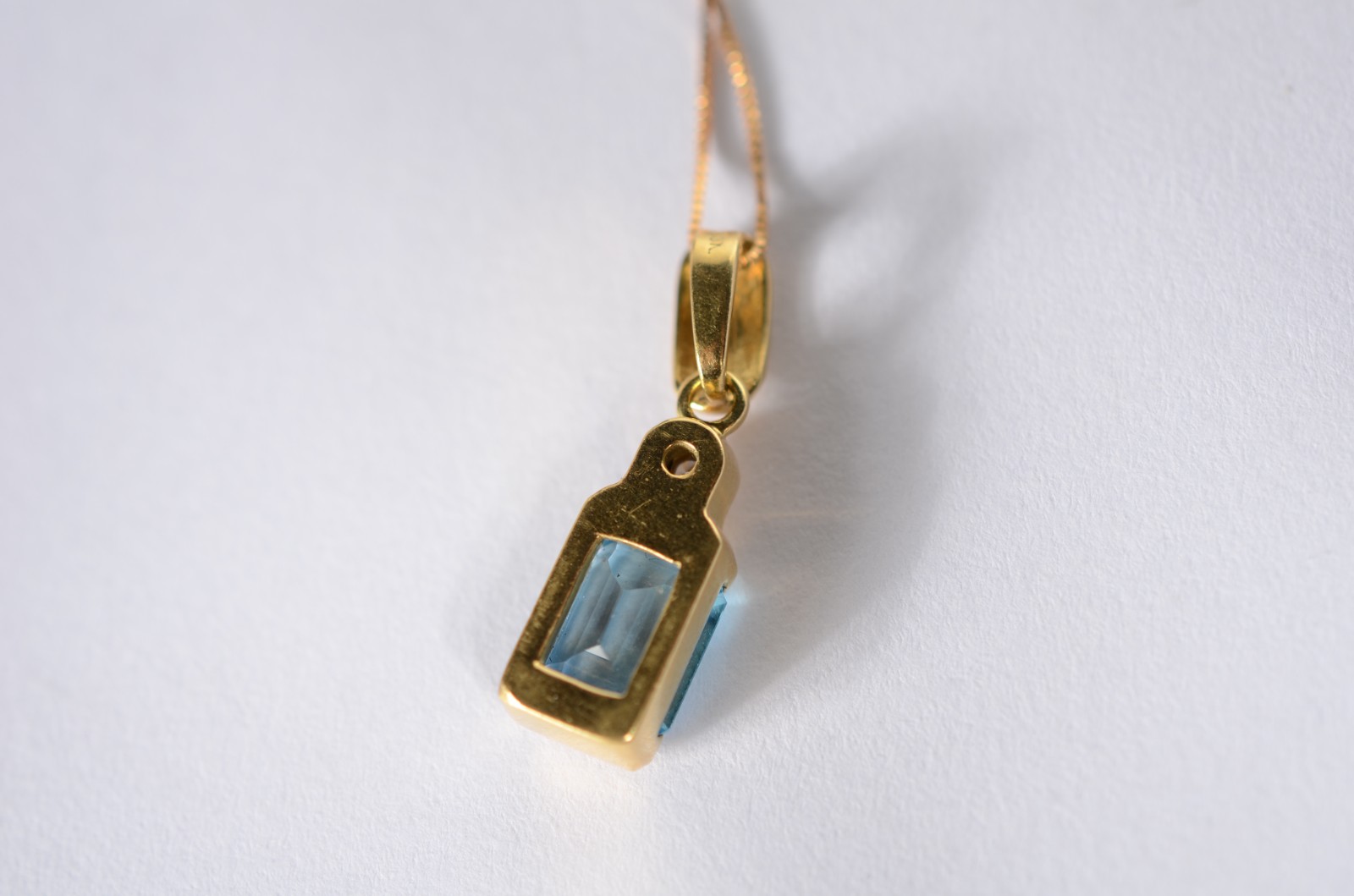 Colar de ouro 18 k., contraste 750 mls com pendente com pedra azul... - foto 7 de 8
