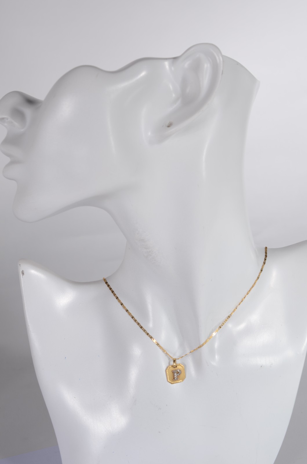 Colar de ouro 18 k., contraste 750 mls, feitio laminado e pendente... - foto 6 de 6