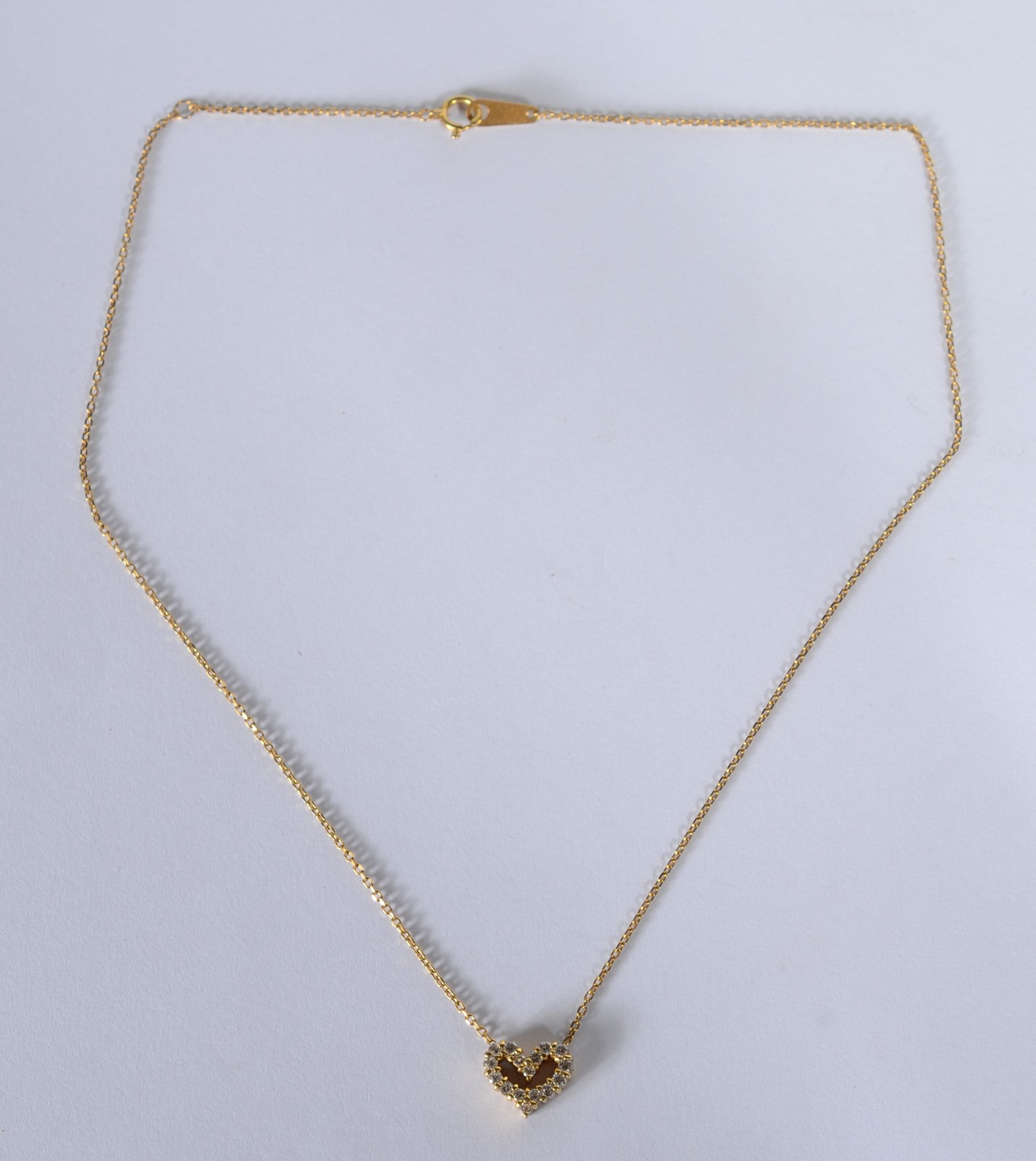 Colar de ouro 18 k., contraste 750 com pendente na forma de coração... - foto 2 de 7