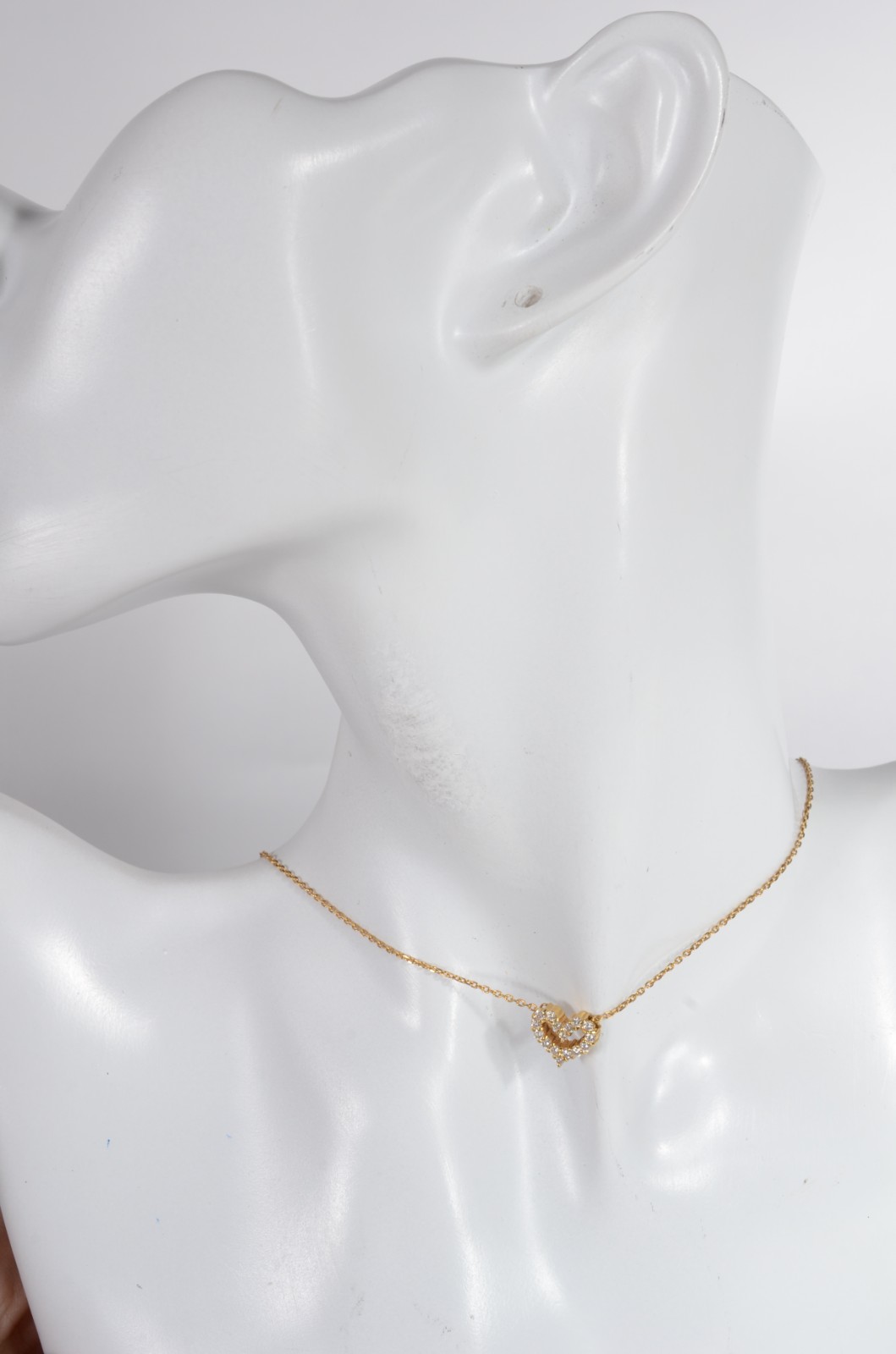 Colar de ouro 18 k., contraste 750 com pendente na forma de coração... - foto 7 de 7