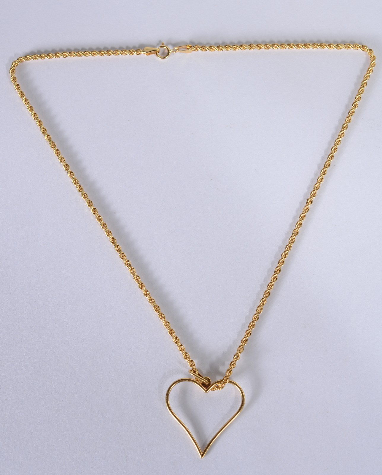 Colar de ouro 18 k., contraste 750 mls com pendente na forma de... - foto 1 de 5