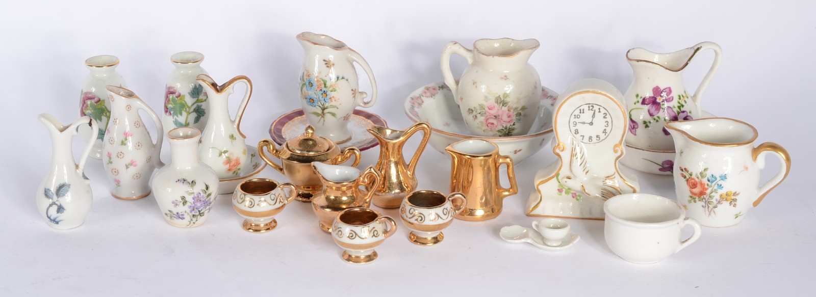 Coleção com 21 peças diversas de miniaturas em porcelana. - foto 1 de 11