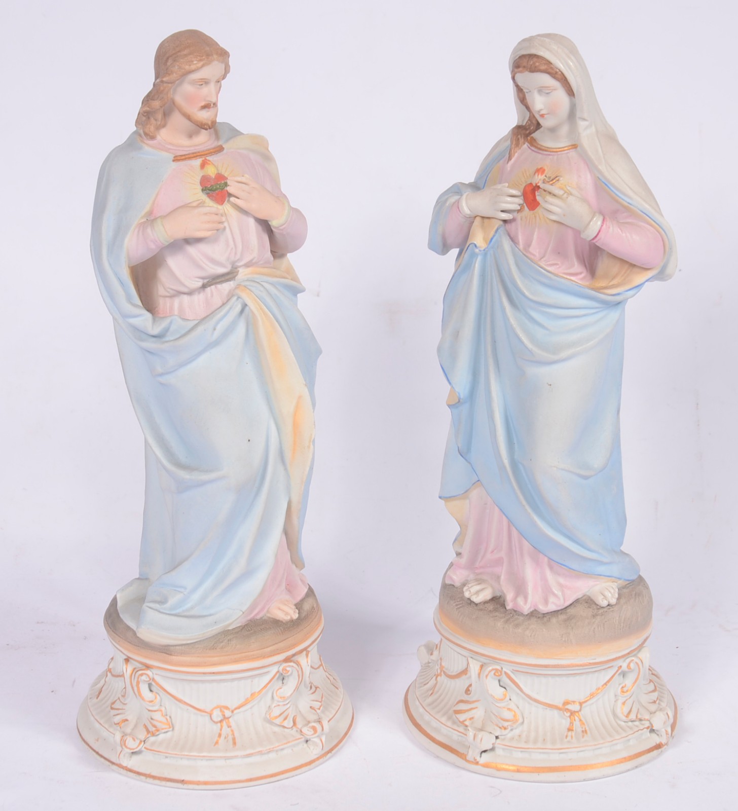 Par de estatuetas de porcelana policromada representando Sagrado... - foto 2 de 7
