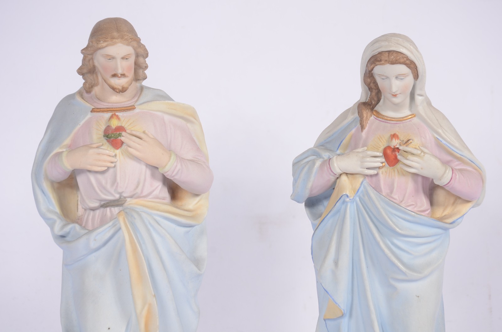 Par de estatuetas de porcelana policromada representando Sagrado... - foto 3 de 7