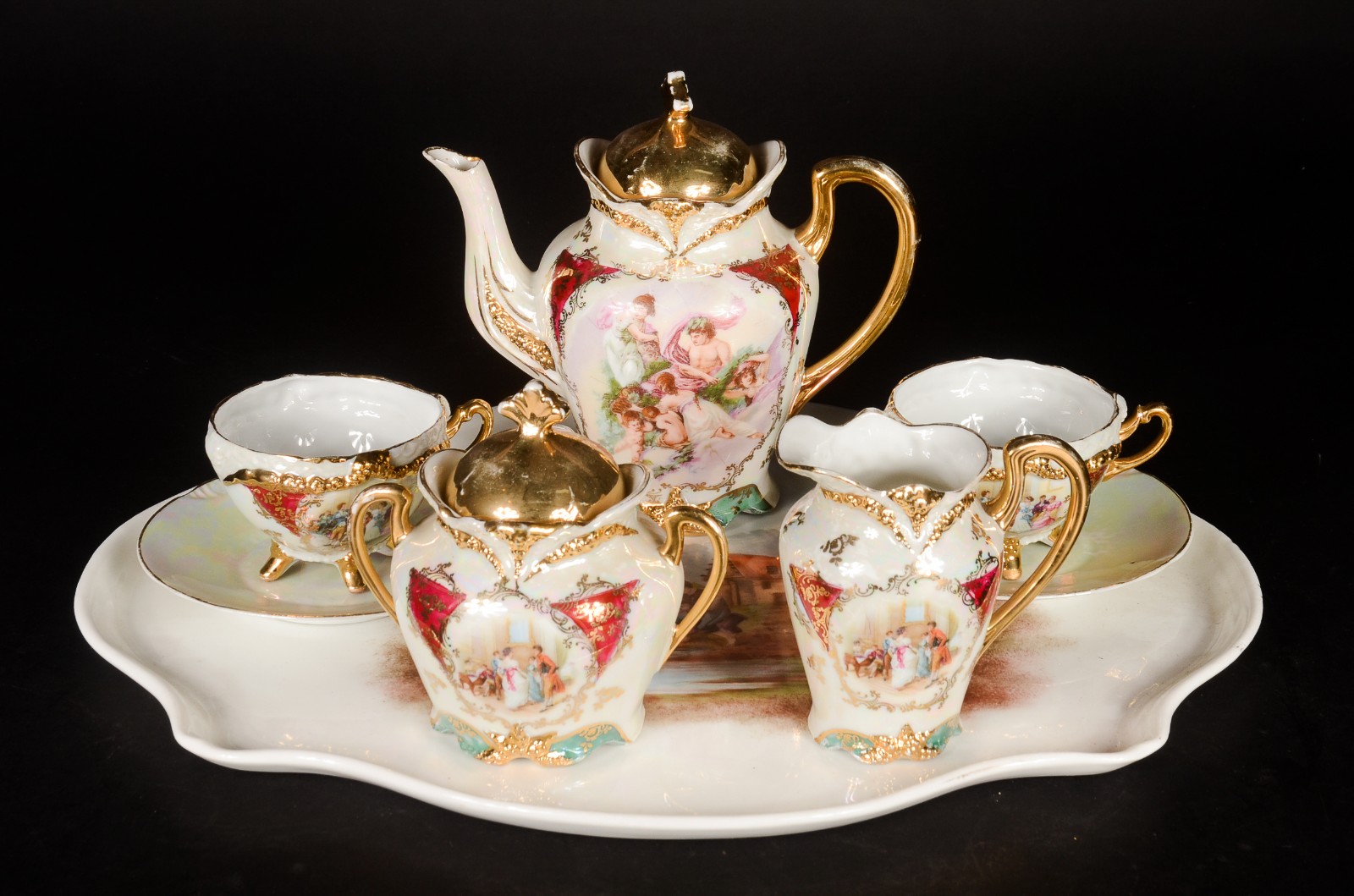 Tetê a tetê de porcelana com cena romântica policromada com 5 peças... - foto 5 de 11