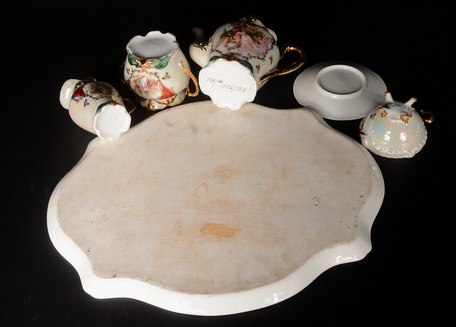 Tetê a tetê de porcelana com cena romântica policromada com 5 peças... - foto 10 de 11