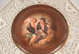 Conjunto de porcelana alemã da  Bavaria, Schuma... - Conjunto de porcelana alemã da  Bavaria, Schumam OTTO, decorados com figuras de crianças e cachorro em policromia, bordas vazadas, composto de p...