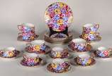MZ Altrohlau,  - Serviço de chá e café de porcelana tcheca, decoração floral em policromia, composto de: 6 xícaras de chá com pires, 6 xícaras de café com pires e 6 pr